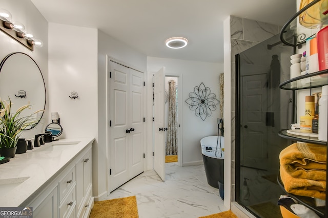 41 Wexford Cir, Cartersville, GA 30121 - full bath with marble look tile flooring, a shower stall, double vanity, a freestanding bath, and a closet