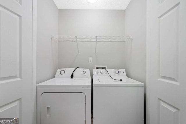 174 Randall Dr, Rockmart, GA 30153 - laundry area with independent washer and dryer and a textured ceiling