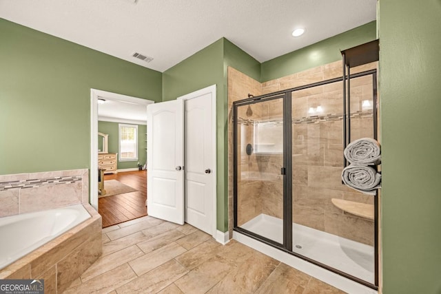 86 Crestview Dr, Guyton, GA 31312 - full bath with a bath and a stall shower