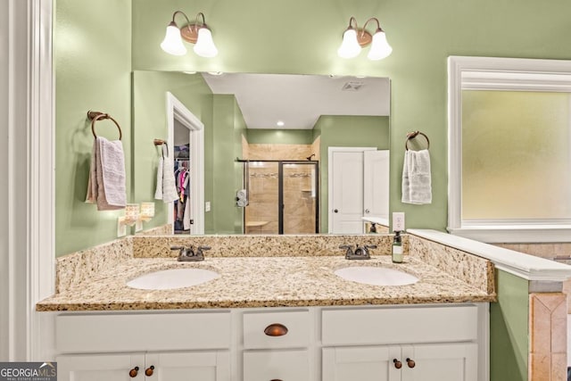 86 Crestview Dr, Guyton, GA 31312 - bathroom with double vanity, a shower stall, and a walk in closet