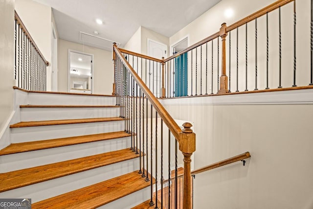 86 Crestview Dr, Guyton, GA 31312 - stairs featuring attic access and recessed lighting