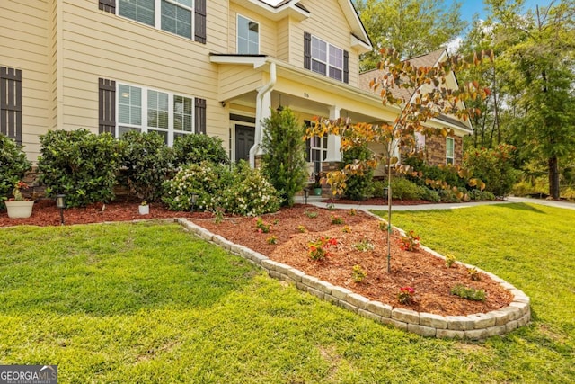86 Crestview Dr, Guyton, GA 31312 - view of front of home with a front yard and a porch