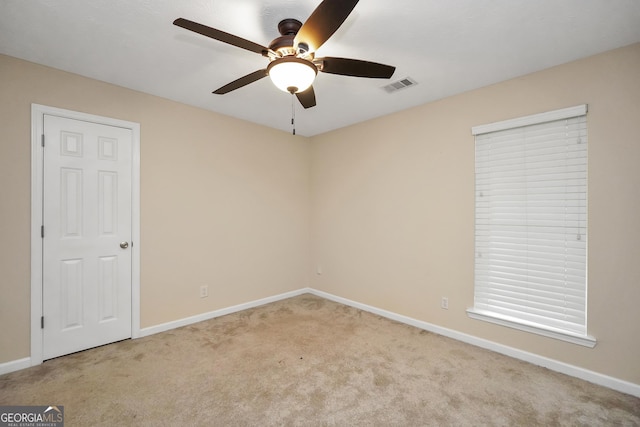 602 Pine Knoll Ct, Mcdonough, GA 30252 - spare room with carpet, a ceiling fan, and baseboards