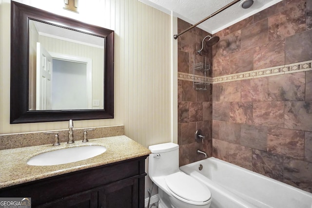 602 Pine Knoll Ct, Mcdonough, GA 30252 - bathroom featuring toilet, vanity,  shower combination, and a textured ceiling