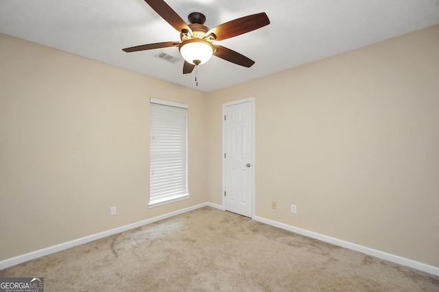 602 Pine Knoll Ct, Mcdonough, GA 30252 - carpeted spare room with baseboards and a ceiling fan