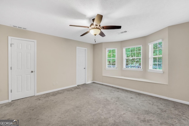 602 Pine Knoll Ct, Mcdonough, GA 30252 - carpeted spare room featuring baseboards and ceiling fan