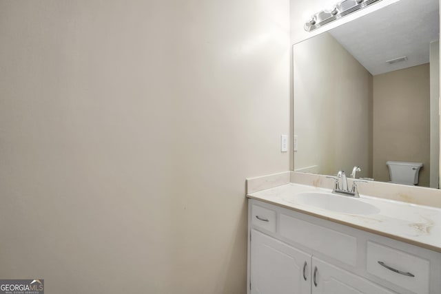 602 Pine Knoll Ct, Mcdonough, GA 30252 - bathroom with vanity and toilet