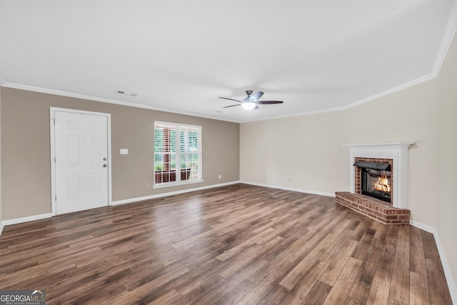 602 Pine Knoll Ct, Mcdonough, GA 30252 - unfurnished living room featuring ornamental molding, wood finished floors, a ceiling fan, a fireplace, and baseboards