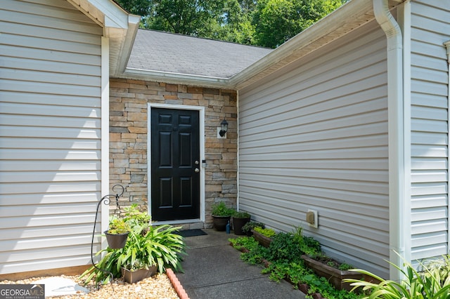 784 Crestworth Xing, Powder Springs, GA 30127 - property entrance featuring stone siding and roof with shingles