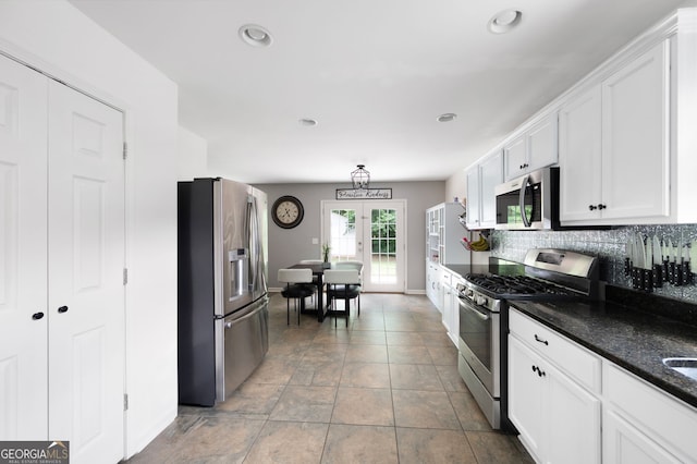784 Crestworth Xing, Powder Springs, GA 30127 - kitchen featuring stainless steel appliances, french doors, white cabinets, backsplash, and recessed lighting