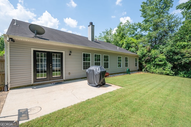 784 Crestworth Xing, Powder Springs, GA 30127 - rear view of house with a patio area, a lawn, a chimney, and french doors
