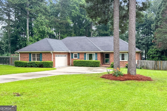 7972 Woods Ln, Jonesboro, GA 30236 - ranch-style house with brick siding, an attached garage, driveway, a shingled roof, and view of scattered trees