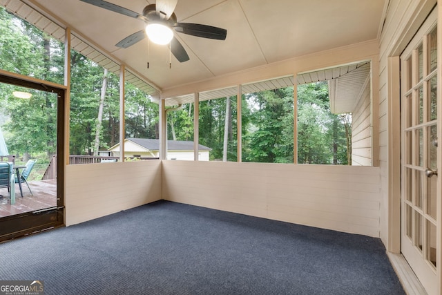 7972 Woods Ln, Jonesboro, GA 30236 - unfurnished sunroom with a ceiling fan, outdoor dining area, and healthy amount of natural light