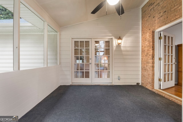 7972 Woods Ln, Jonesboro, GA 30236 - unfurnished sunroom featuring french doors and lofted ceiling