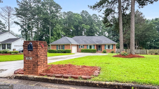 7972 Woods Ln, Jonesboro, GA 30236 - view of front of house with an attached garage, concrete driveway, and brick siding