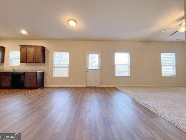 279 Darling Ln, Pendergrass, GA 30567 - unfurnished living room featuring wood finished floors and ceiling fan