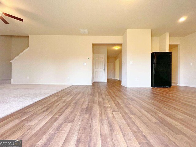 279 Darling Ln, Pendergrass, GA 30567 - unfurnished living room with ceiling fan and light wood finished floors
