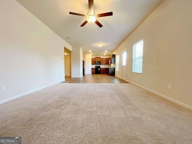 279 Darling Ln, Pendergrass, GA 30567 - unfurnished living room with light colored carpet and a ceiling fan