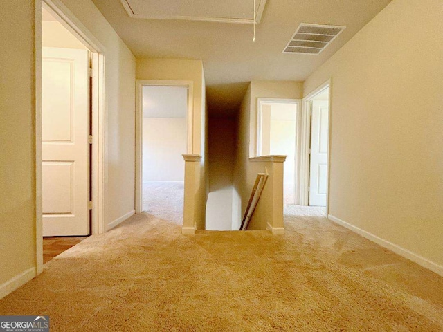 279 Darling Ln, Pendergrass, GA 30567 - corridor featuring carpet floors, attic access, and an upstairs landing