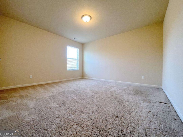 279 Darling Ln, Pendergrass, GA 30567 - carpeted spare room with baseboards and lofted ceiling