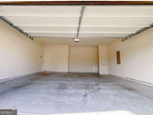 279 Darling Ln, Pendergrass, GA 30567 - garage featuring a garage door opener and electric panel