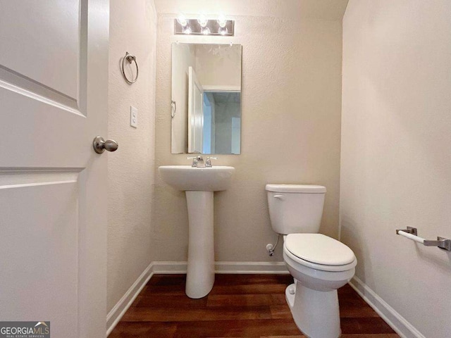 279 Darling Ln, Pendergrass, GA 30567 - bathroom featuring toilet and wood finished floors