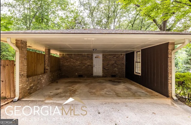1236 S Shadygrove Ct, Stone Mountain, GA 30083 - view of parking / parking lot featuring an attached carport