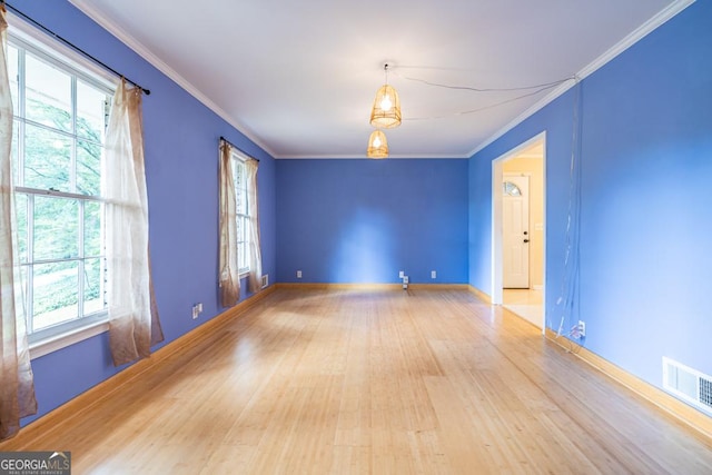 1236 S Shadygrove Ct, Stone Mountain, GA 30083 - empty room with wood finished floors and crown molding