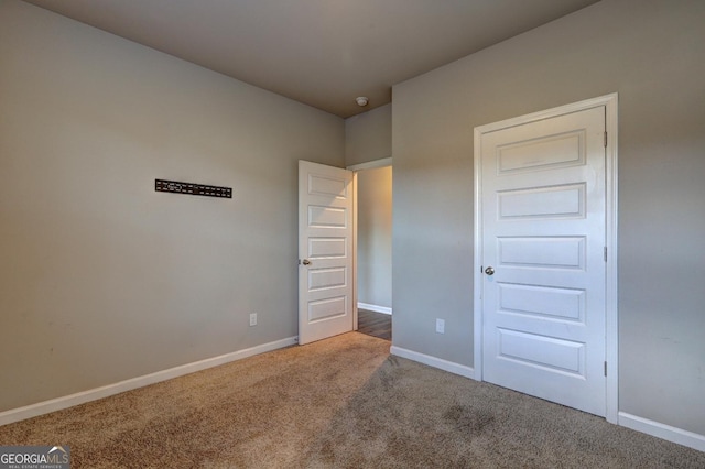 237 Cranapple Ln, Mcdonough, GA 30253 - unfurnished bedroom with carpet and baseboards