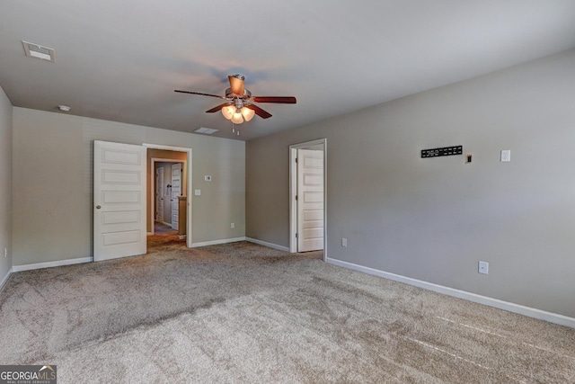 237 Cranapple Ln, Mcdonough, GA 30253 - unfurnished bedroom featuring carpet flooring, baseboards, and a ceiling fan