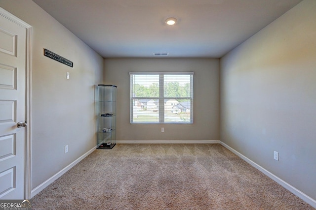 237 Cranapple Ln, Mcdonough, GA 30253 - spare room featuring carpet and baseboards