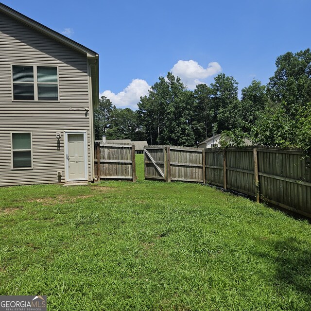 1649 Deer Creek Ln, Monroe, GA 30655 - view of fenced backyard