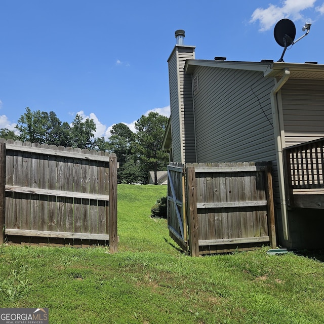 1649 Deer Creek Ln, Monroe, GA 30655 - view of side of home featuring a chimney