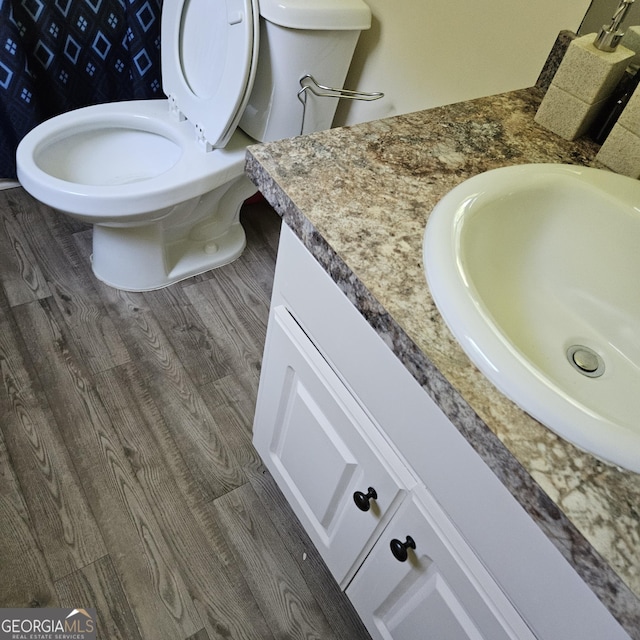 1649 Deer Creek Ln, Monroe, GA 30655 - bathroom featuring vanity and wood finished floors