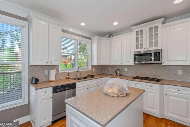 5810 Old Mill Trce, Lithonia, GA 30038 - kitchen featuring stainless steel appliances, a sink, white cabinets, and recessed lighting