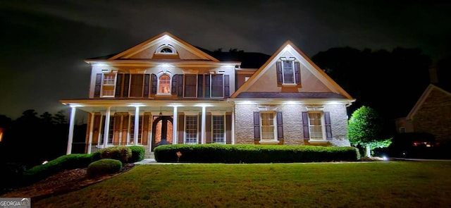 5810 Old Mill Trce, Lithonia, GA 30038 - view of front of home with a yard, covered porch, and stucco siding