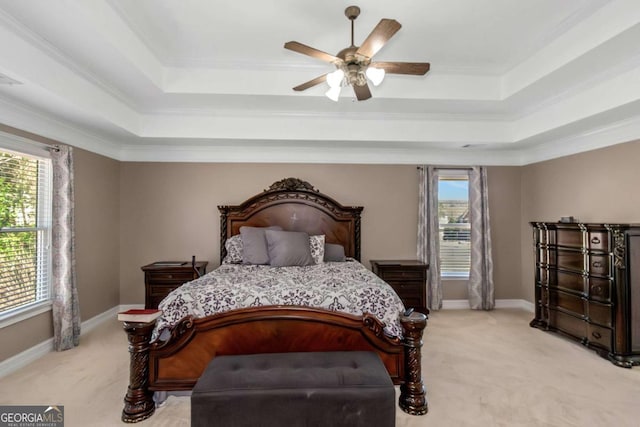 5810 Old Mill Trce, Lithonia, GA 30038 - bedroom featuring a tray ceiling, light carpet, ornamental molding, a ceiling fan, and baseboards