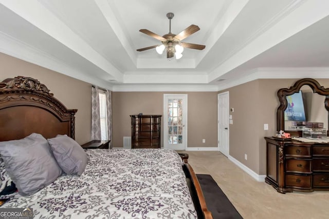 5810 Old Mill Trce, Lithonia, GA 30038 - bedroom featuring light colored carpet, a tray ceiling, baseboards, a ceiling fan, and ornamental molding