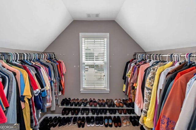 5810 Old Mill Trce, Lithonia, GA 30038 - spacious closet featuring vaulted ceiling