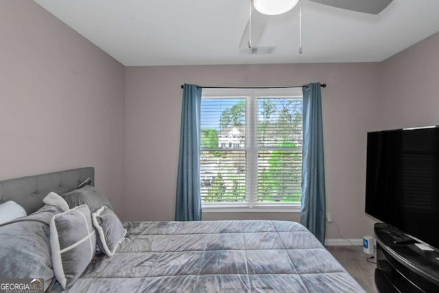 5810 Old Mill Trce, Lithonia, GA 30038 - bedroom featuring ceiling fan, baseboards, and attic access
