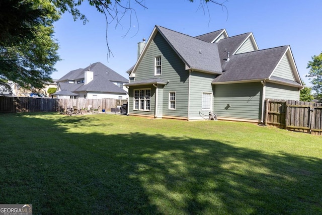 330 Bay Grove Rd, Loganville, GA 30052 - back of property with a fenced backyard and roof with shingles