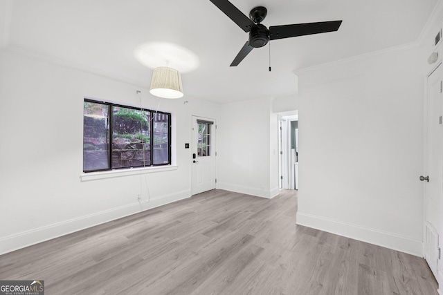 330 3rd St NE Apt 1, Atlanta, GA 30308 - empty room featuring wood finished floors, ceiling fan, and crown molding