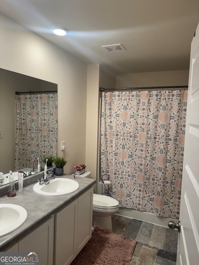 2276 Waycross Ln Unit 21, Dacula, GA 30019 - full bathroom featuring double vanity, toilet, and a shower with curtain