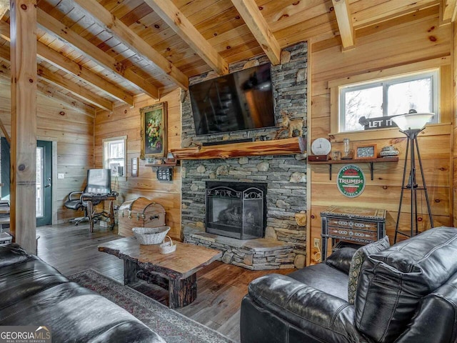 721 Dial Rd, Blue Ridge, GA 30513 - living room with wooden ceiling, wooden walls, hardwood / wood-style flooring, and a stone fireplace