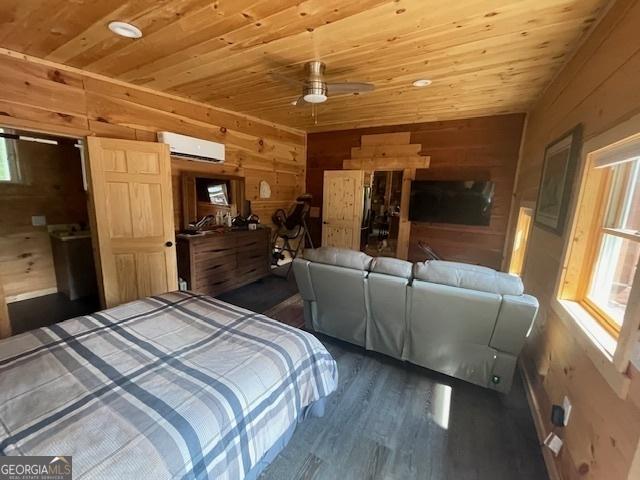 721 Dial Rd, Blue Ridge, GA 30513 - bedroom featuring a wall mounted AC, wooden walls, multiple windows, wooden ceiling, and wood finished floors