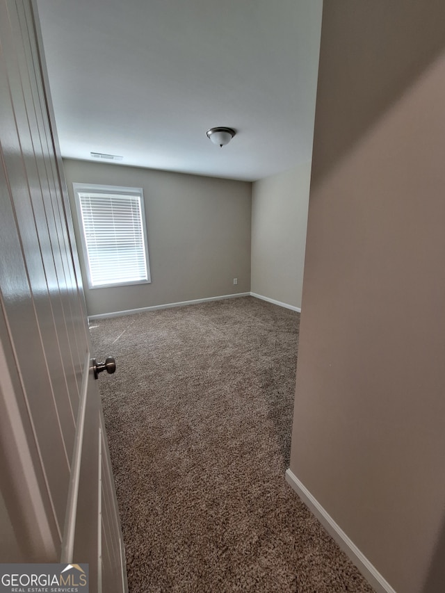489 Asbury Mill Rd, Cleveland, GA 30528 - empty room featuring carpet floors and baseboards