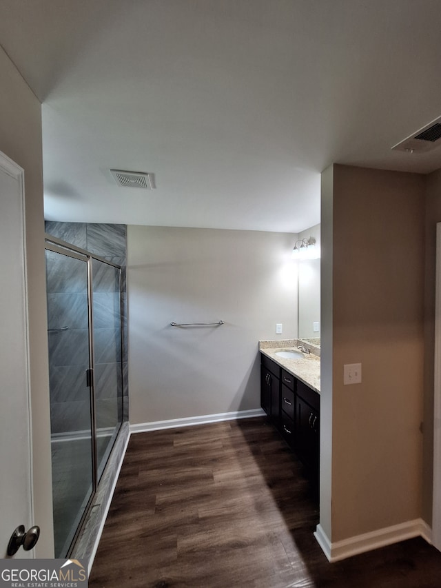 489 Asbury Mill Rd, Cleveland, GA 30528 - full bathroom with vanity, a shower stall, and baseboards