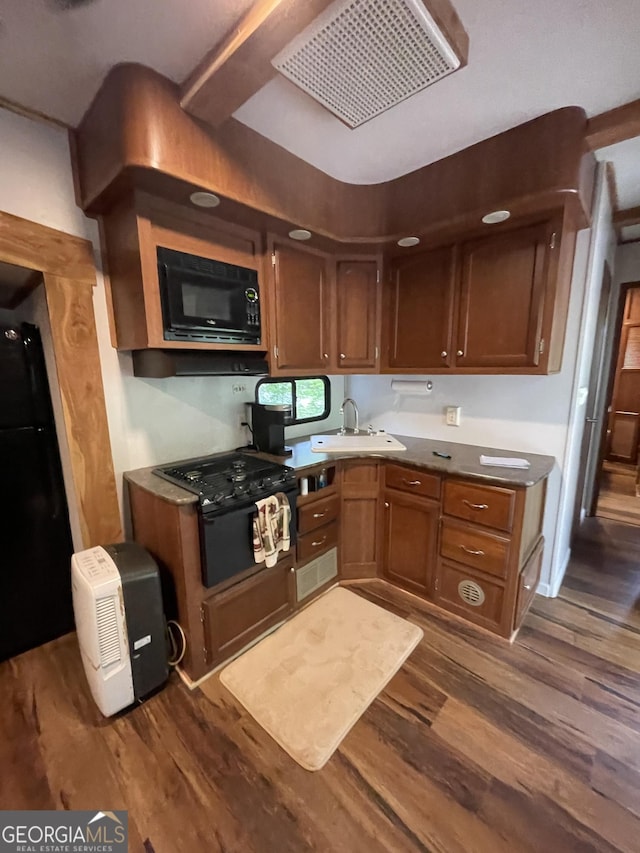22 Nob Hill Rdg, Cleveland, GA 30528 - kitchen featuring black appliances, a sink, and dark wood-style floors