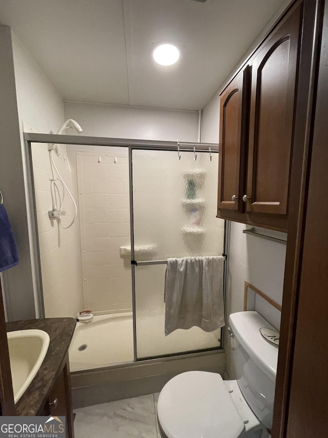 22 Nob Hill Rdg, Cleveland, GA 30528 - bathroom with toilet, vanity, a shower stall, and marble finish flooring