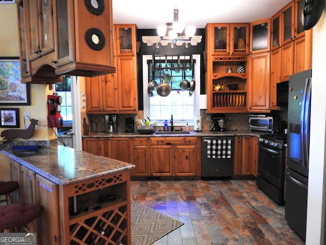 120 Sunrock Mountain Trce, Blue Ridge, GA 30513 - kitchen with dishwashing machine, gas stove, and brown cabinets